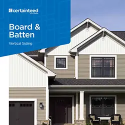 Vertical Board and Batten Siding with a warm wood finish, highlighting its charming, traditional architectural style.