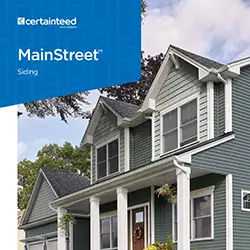 Main street building exterior featuring distinct siding and a welcoming entrance.